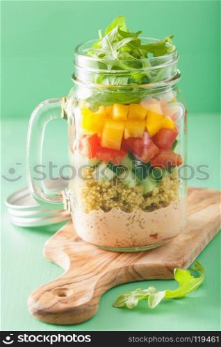 vegan quinoa vegetable salad in mason jars