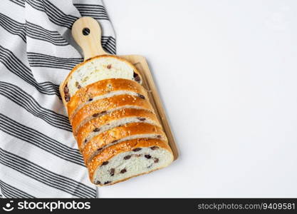 Vegan sliced fine whole wheat bread on white background for bakery, food and eating concept