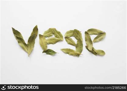 vege lettering made bay laurel leaves