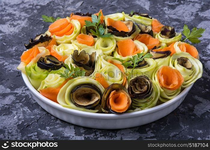 Vegetable chopped spiral. Salad from chopped eggplant, squash and carrots