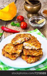 Vegetable cutlets with chicken, peppers and pumpkin. Studio Photo. Vegetable cutlets with chicken, peppers and pumpkin