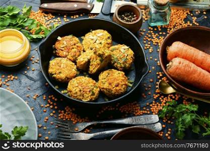 Vegetable diet cutlets made from carrots and lentils.Tasty vegetarian cutlets.Healthy food.. Vegetarian carrot and lentil cutlets