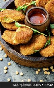 Vegetable diet cutlets made from green peas.Healthy nutrition.. Peas cutlets on a plate