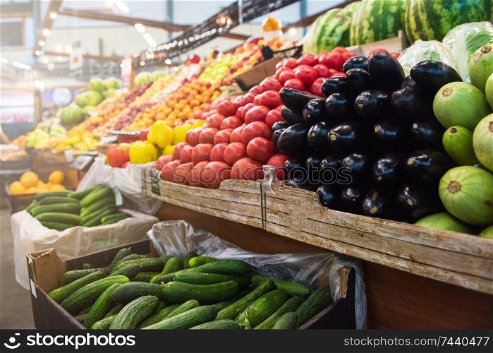 Vegetable farmer market counter: colorful various fresh organic healthy vegetables at grocery store. Healthy natural food concept. Vegetable farmer market counter