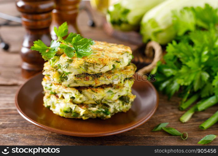 Vegetable fritters with zucchini and greens