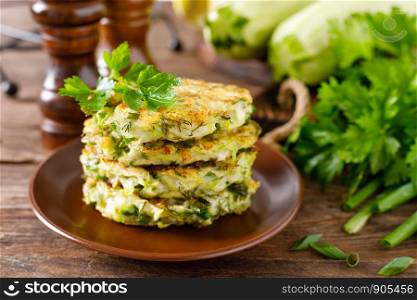 Vegetable fritters with zucchini and greens
