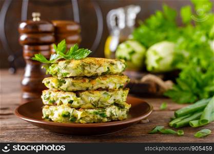 Vegetable fritters with zucchini and greens