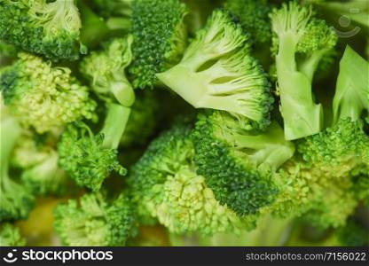 Vegetable healthy green organic raw broccoli florets ready for cooking food / Close up Slice Broccoli Background