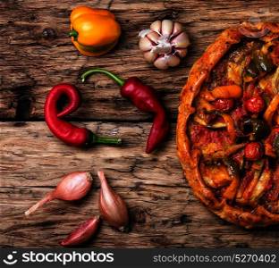 vegetable homemade pizza. vegetarian spicy homemade vegetable pizza on a rustic retro background