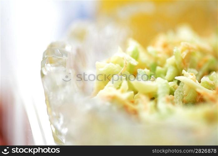 Vegetable salad closeup with white chicken meat