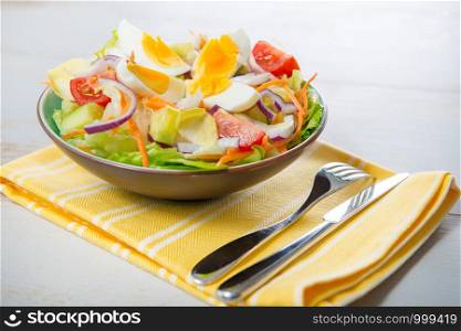 vegetable salad on the yellow towel