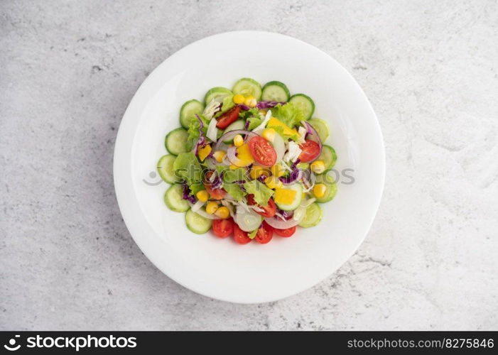 Vegetable salad with boiled eggs in a white dish. Selective focus.