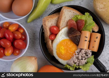 Vegetable salad with bread and boiled eggs in the pan. Selective focus.