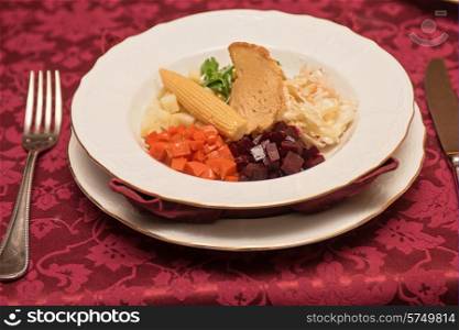 vegetable salad with bread at plate. vegetable salad