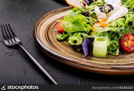 Vegetable salad with poached egg on a plate