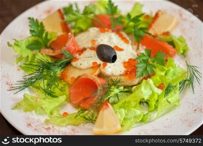vegetable salad with smoked salmon . salmon salad