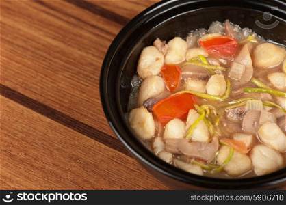 Vegetable soup. Vegetable soup with mushrooms closeup