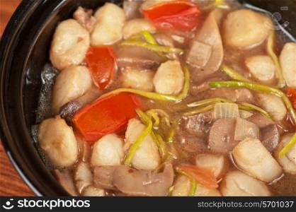 Vegetable soup with mushrooms closeup