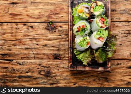 Vegetable spring rolls. Assorted Asian spring rolls with vegetable and lettuce
