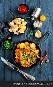 vegetable stew in pan, fried vegetables with oil and spice