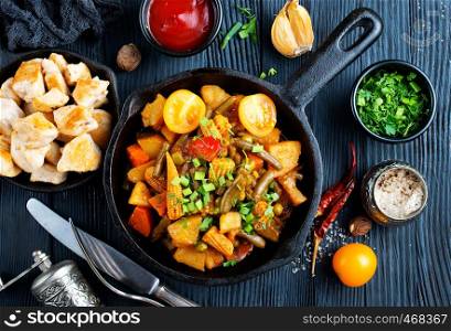 vegetable stew in pan, fried vegetables with oil and spice