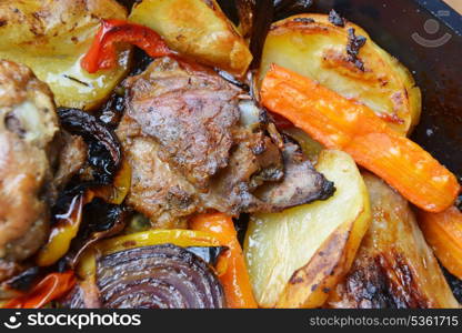 vegetables and chicken in pan baked in oven