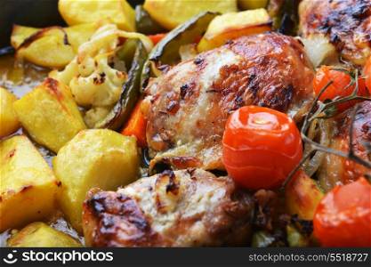 vegetables and chicken in pan baked in oven