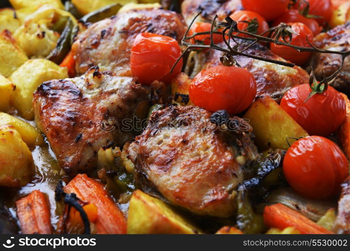 vegetables and chicken in pan baked in oven