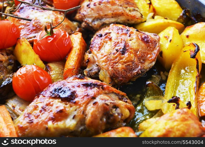 vegetables and chicken in pan baked in oven