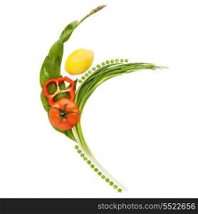 Vegetables and fruits arranged in a shape of a happy slim ballet dancer.
