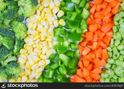 Vegetables and fruits background healthy food for life / Assorted fresh fruit yellow and green vegetables mixed selection various broccoli bell pepper carrot corn slice and yardlong beans for health