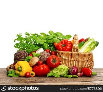 vegetables and herbs in shopping basket. healthy food
