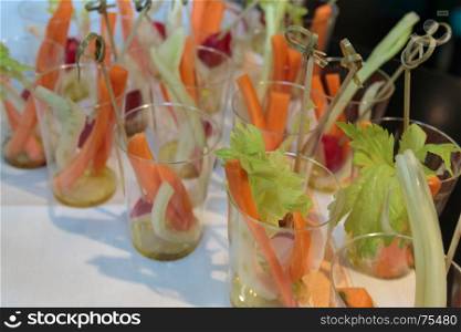 Vegetables Appetizer inside Glasses with Oil and Sticks, Healty Food