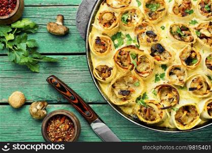 Vegetables baked with cheese in pita bread. Casserole. Vegetable casserole in pita bread