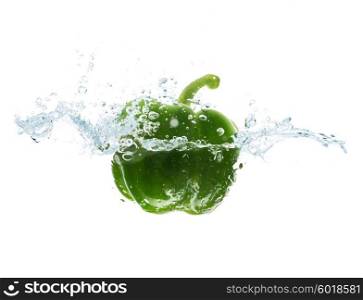 vegetables, food and healthy eating concept - close up of fresh green pepper falling or dipping in water with splash over white background