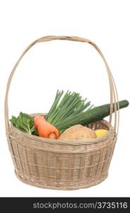 Vegetables in basket isolated on white background