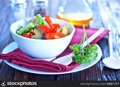 vegetables in bowl and on a table