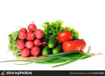 Vegetables in kitchen for salad on wooden hardboard, isolated on white