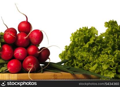 Vegetables in kitchen for salad on wooden hardboard, isolated on white
