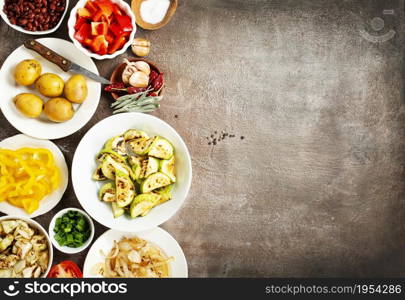 Vegetables in plates. baked and fried vegetables. Selective focus.