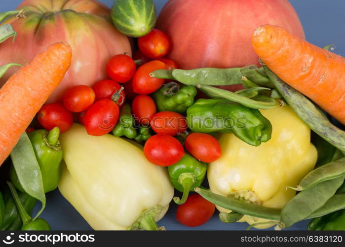 vegetables on a blue wooden surface