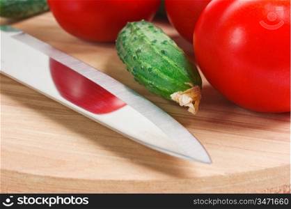 vegetables on a cutting board isolated on white