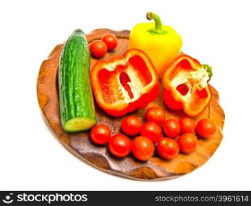 vegetables on a cutting board on white