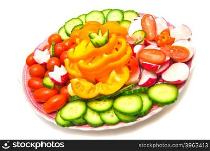 vegetables on a plate close-up on white background