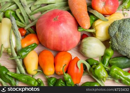 vegetables on a wooden surface