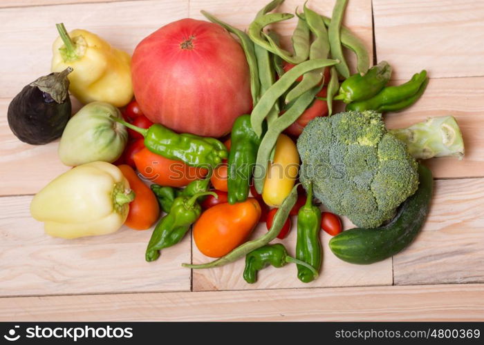 vegetables on a wooden surface