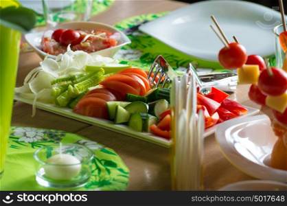 Vegetables on table at cafe. Salad ingredient