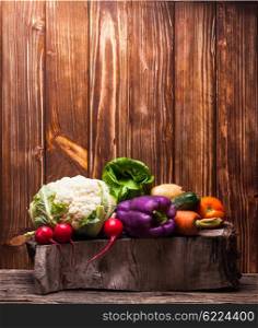 Vegetables on the wooden stump. Colorfull compostiton with copy space. Vegetables still life