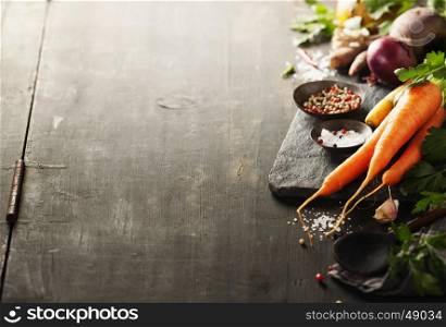 Vegetables on wood. Bio Healthy food, herbs and spices. Organic vegetables on wood. Cooking concept