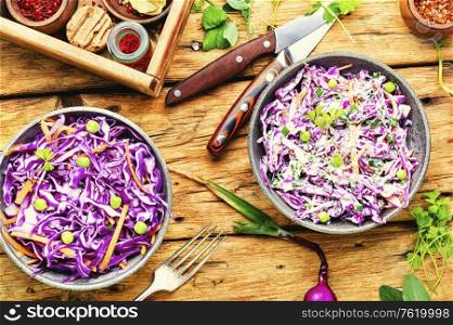 Vegetables salad with purple cabbage.Coleslaw in a bowl.Healthy eating. Coleslaw salad of red cabbage